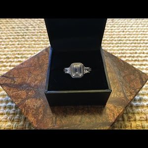 BEAUTIFUL EMERALD CUT RING.  CZ AND 925